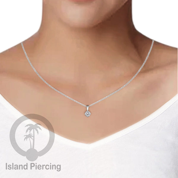 Liontin kecil warna silver dengan Kristal Zircon. Steel Necklace with Zirconia Crystals