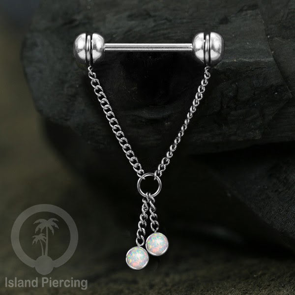 Tindik puting Stainless Steel dengan rantai dan batu asli, warna gold atau silver. Nipple piercing.