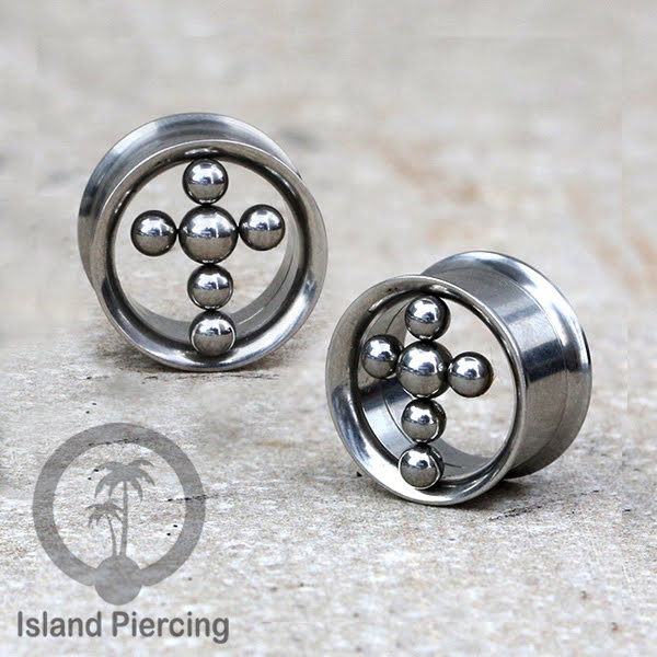 Anting tunnel Piercing stainless warna gold dan silver dengan desain menarik