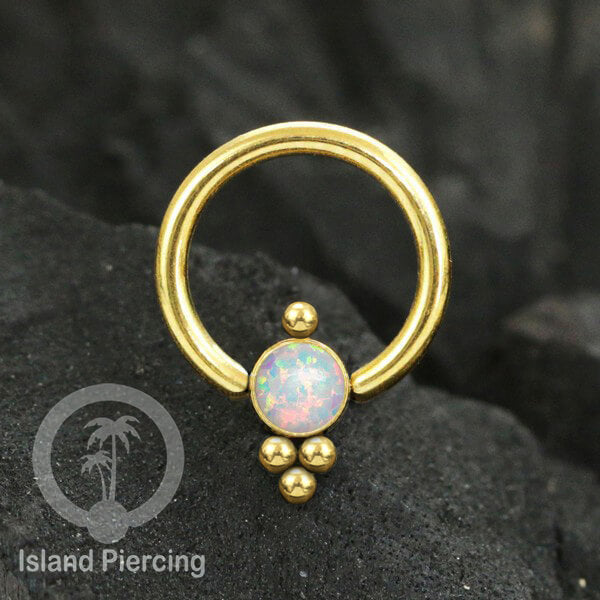 BCR piercing stainless warna gold dengan batu. Tragus, daith, helix, tindik alis dan septum ring