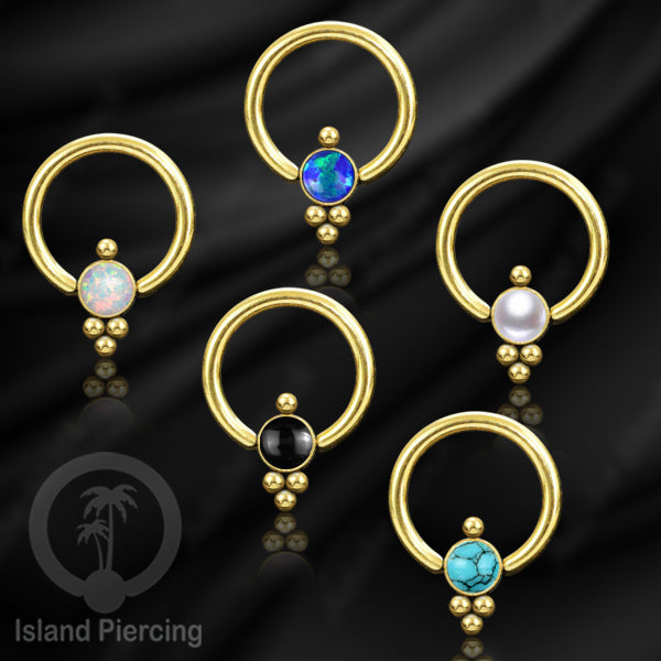 BCR piercing stainless warna gold dengan batu. Tragus, daith, helix, tindik alis dan septum ring