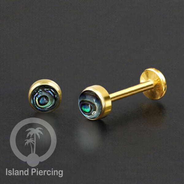 Tindik labret push system stainless, threadless piercing warna gold dengan abelone, opal putih dan biru.