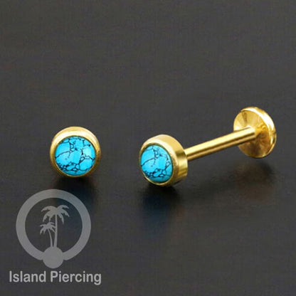 Tindik labret push system, threadless piercing warna gold dengan banyak variasi batu