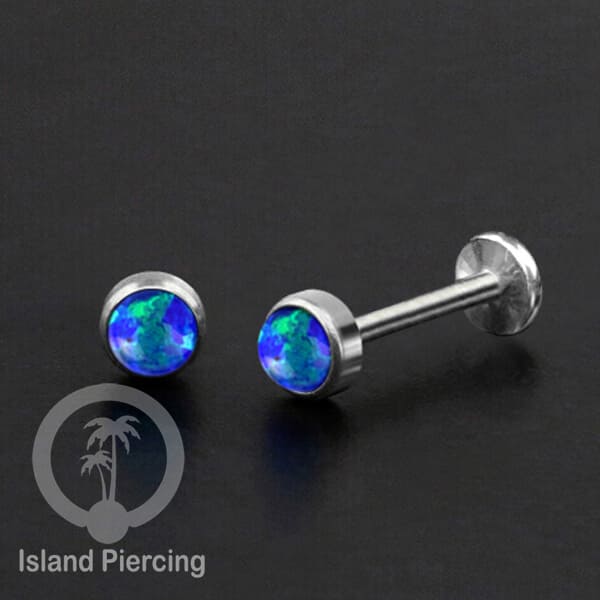 Tindik labret push system stainless, threadless piercing warna silver dengan abelone, opal putih dan biru.