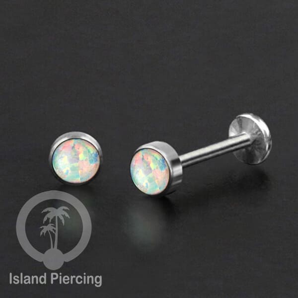 Tindik labret push system stainless, threadless piercing warna silver dengan abelone, opal putih dan biru.